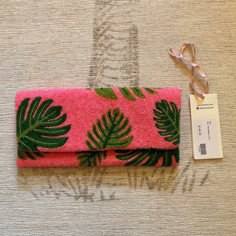 TIANA NY beaded palm clutch